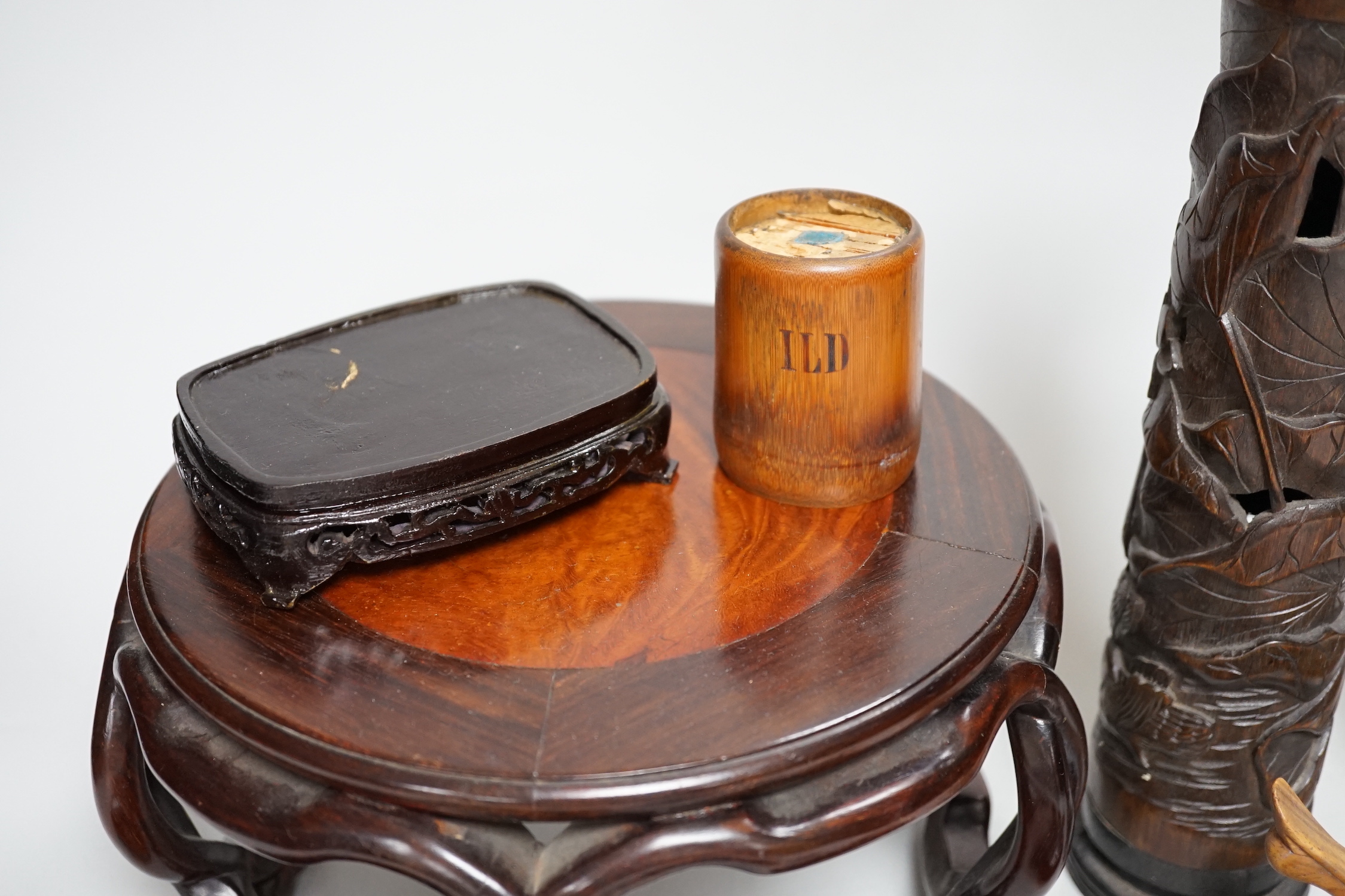 A group of Chinese wood stands and a perfume holder